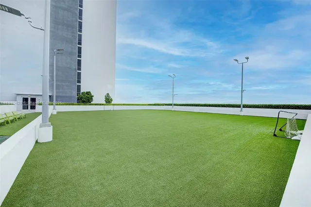 a view of an house with a yard