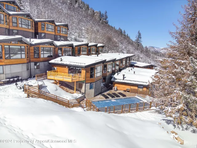 a picture of mountains and city view