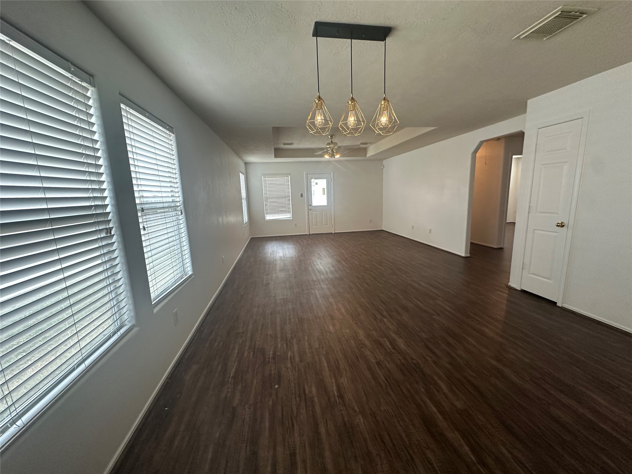 10331 Ravenwood View Lane Houston, TX 77075 - Photo 2 of 11 wooden floor in an empty room with a window