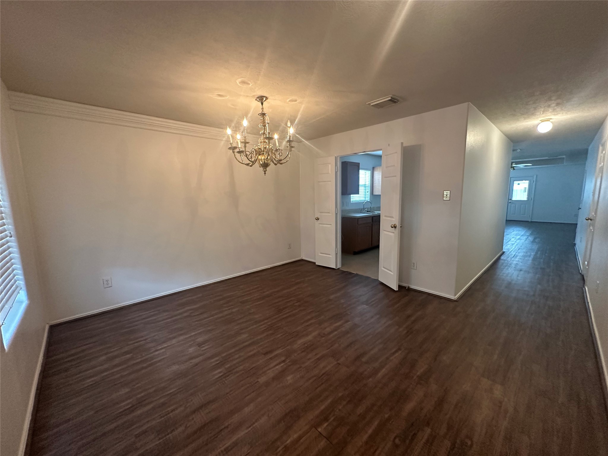 10331 Ravenwood View Lane Houston, TX 77075 - Photo 3 of 11 a view of a room with wooden floor