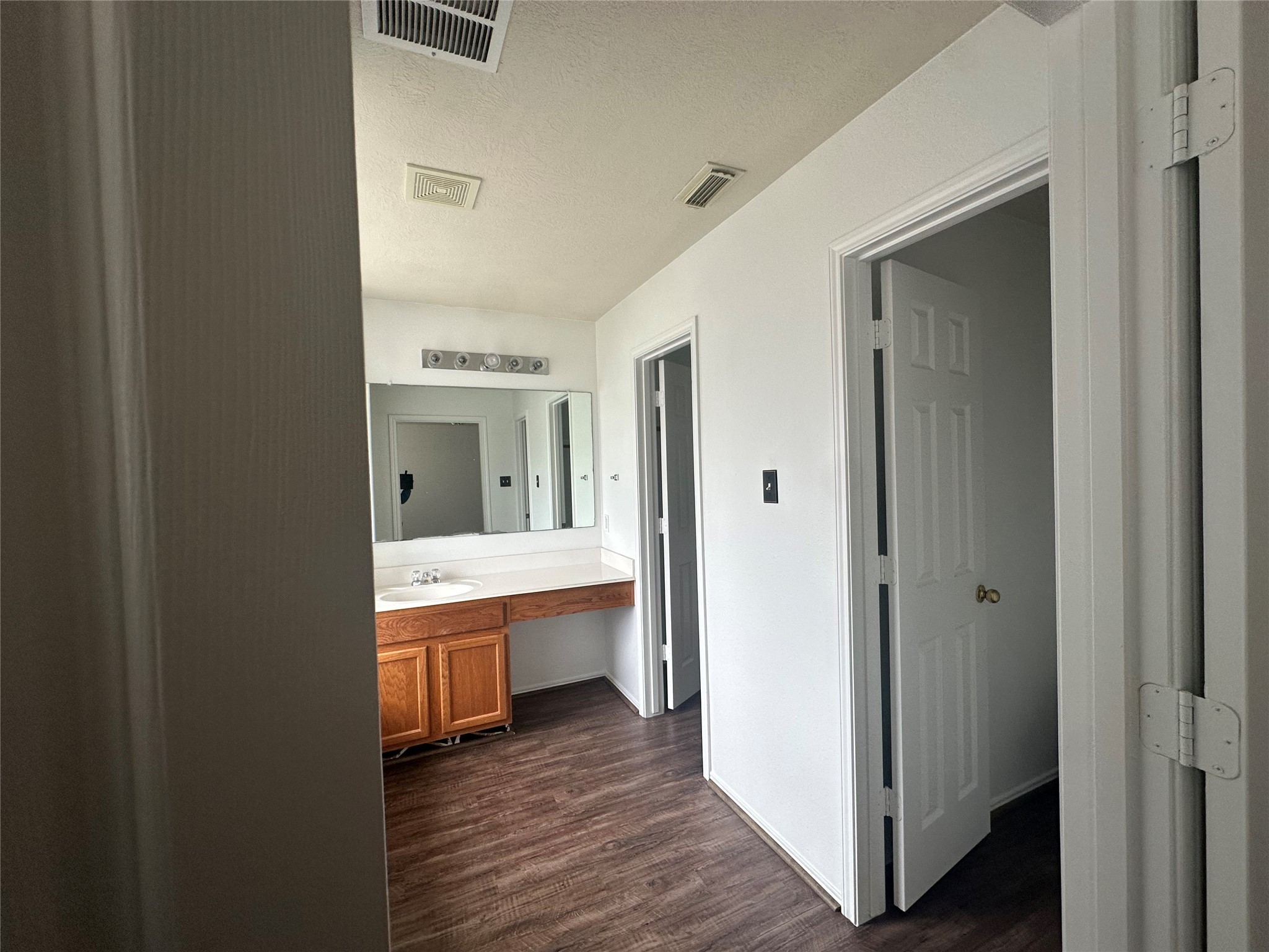 10331 Ravenwood View Lane Houston, TX 77075 - Photo 6 of 11 a bathroom with a sink and mirror