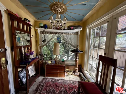 a view of a porch with furniture
