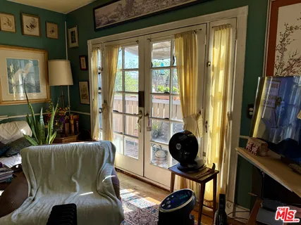 a room with furniture and a book shelf
