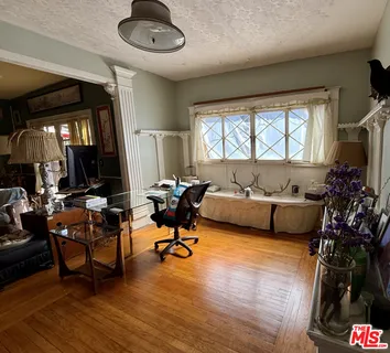 a view of a kitchen with a refrigerator
