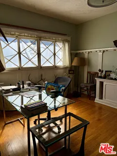 a kitchen with stainless steel appliances a stove a sink and a refrigerator