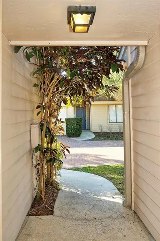 a view of a house with a tree