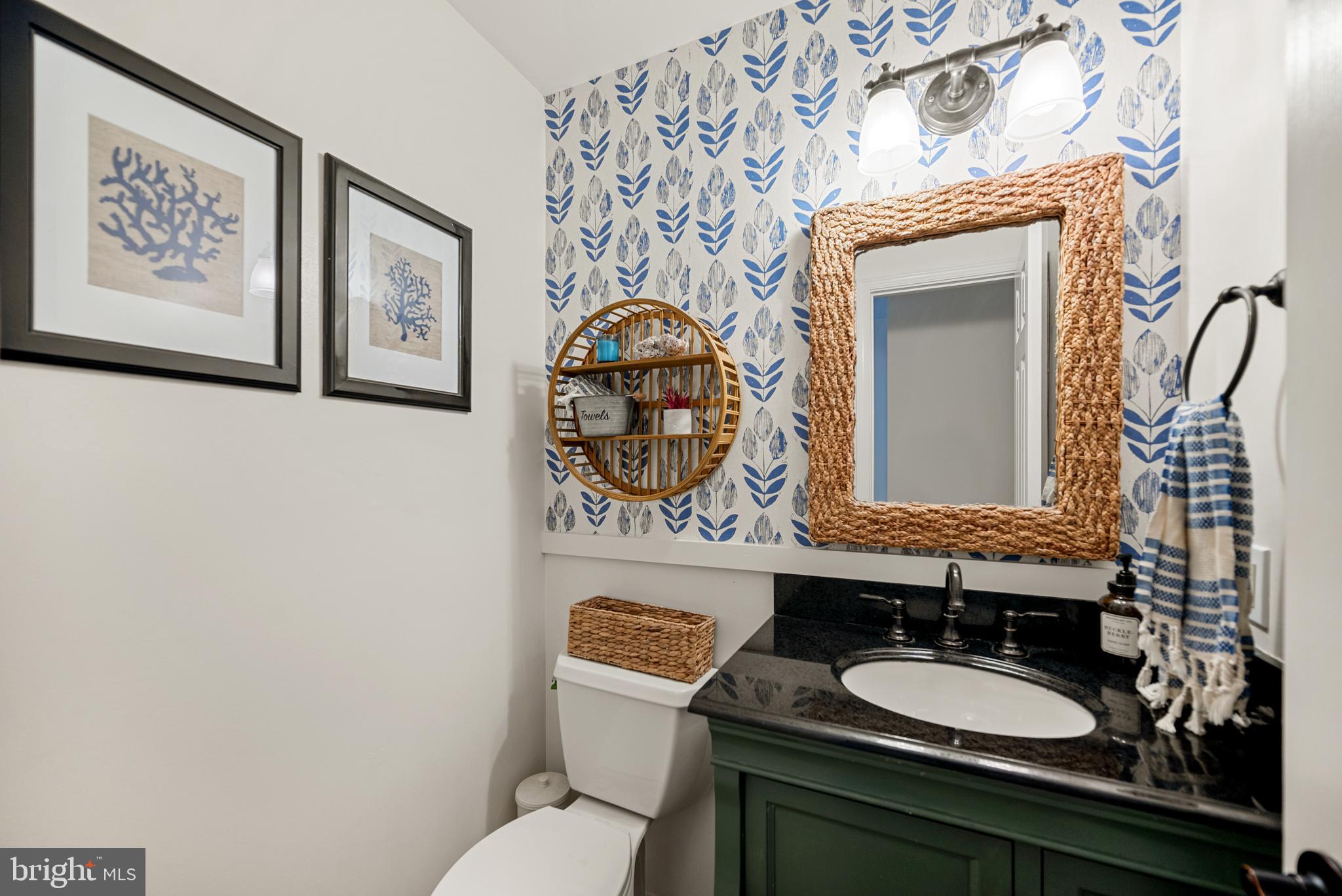 7838 Roundabout Way Springfield, VA 22153 - Photo 20 of 56 a bathroom with a toilet sink and mirror