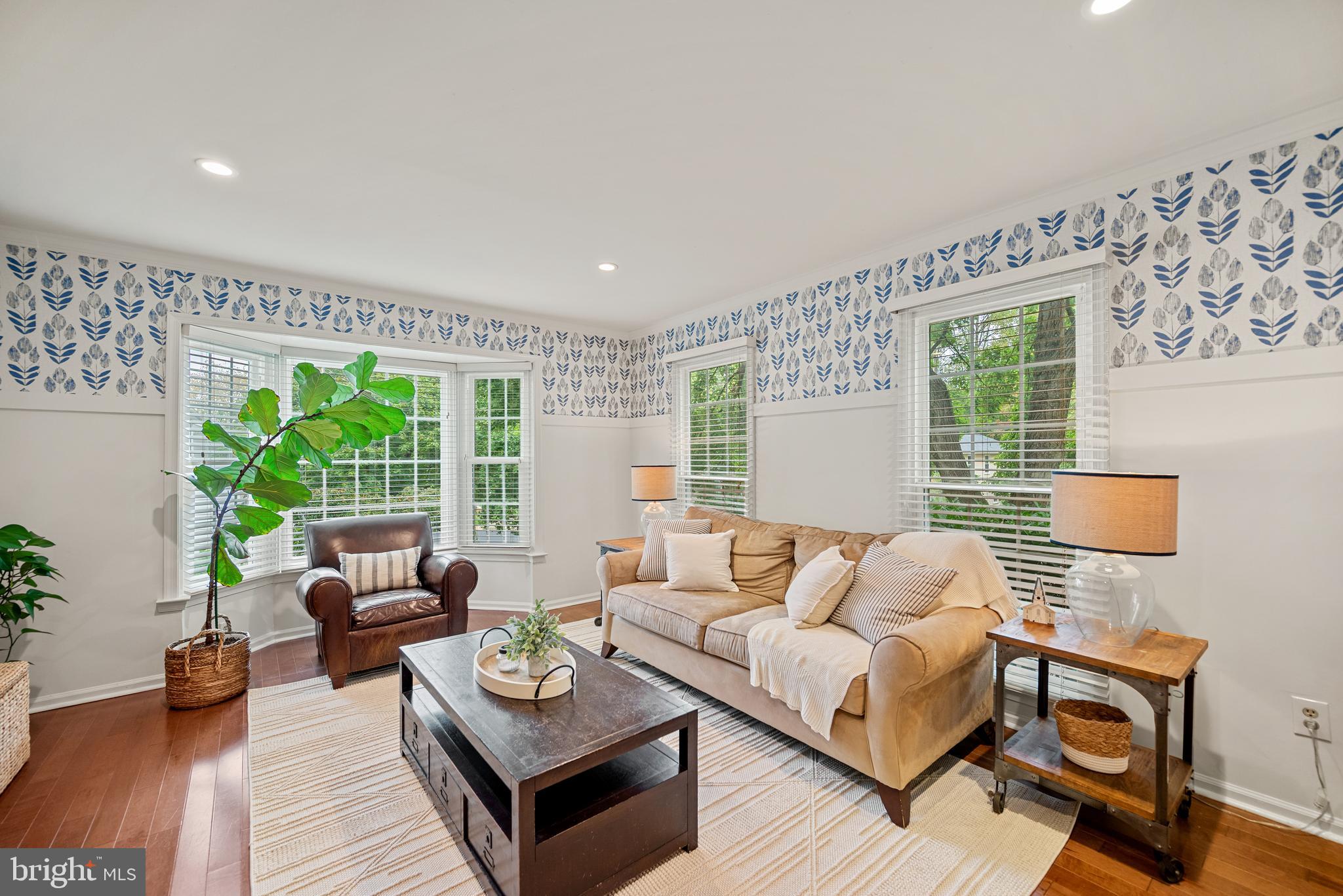 7838 Roundabout Way Springfield, VA 22153 - Photo 2 of 56 a living room with furniture and a large window