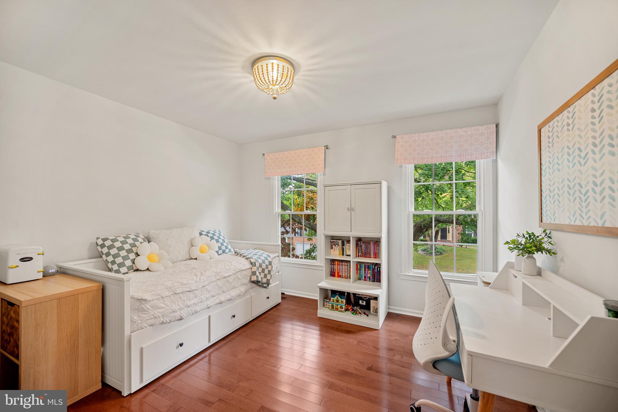 7838 Roundabout Way Springfield, VA 22153 - Photo 29 of 56 a bedroom with a bed and a large window