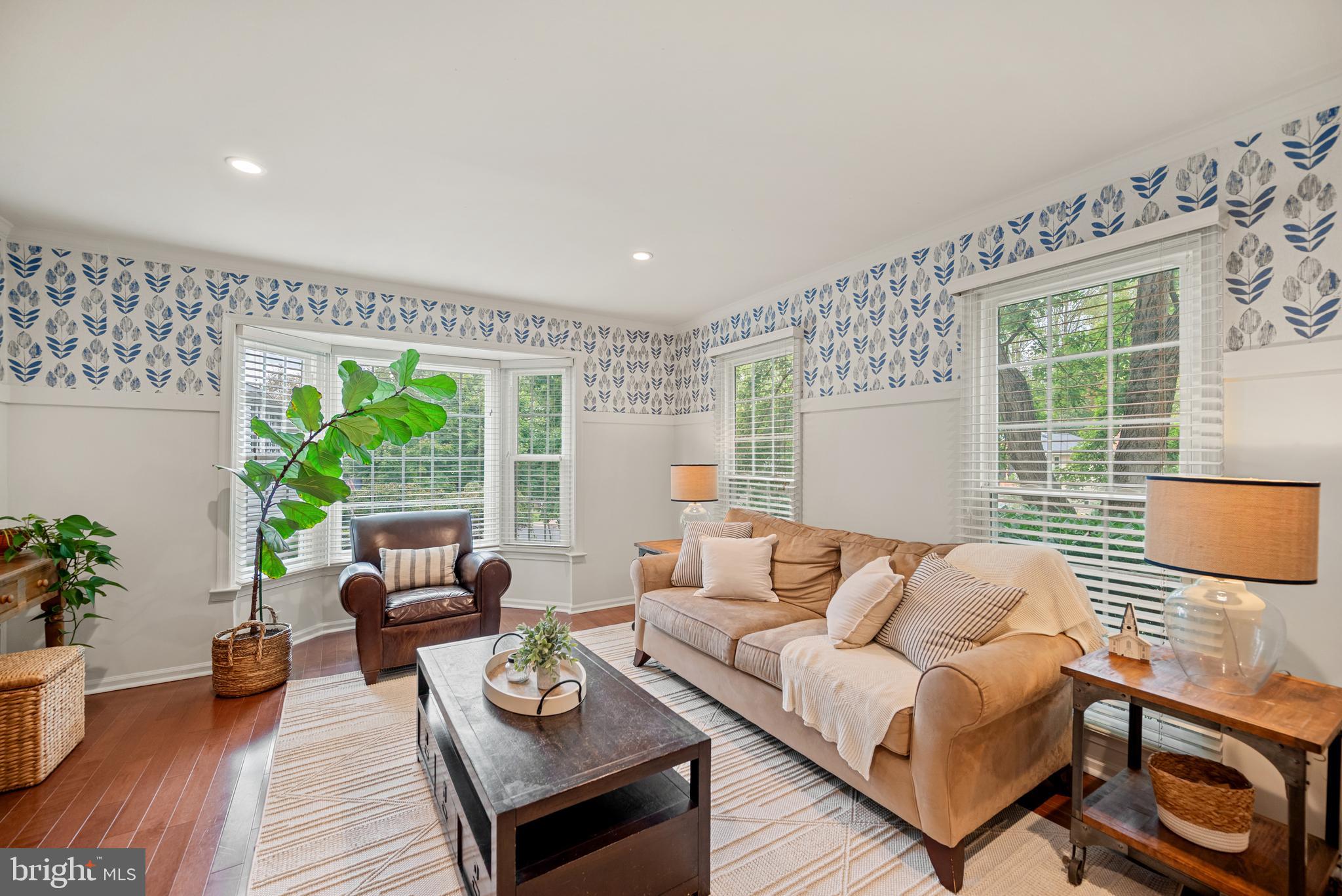 7838 Roundabout Way Springfield, VA 22153 - Photo 5 of 56 a living room with furniture and a large window