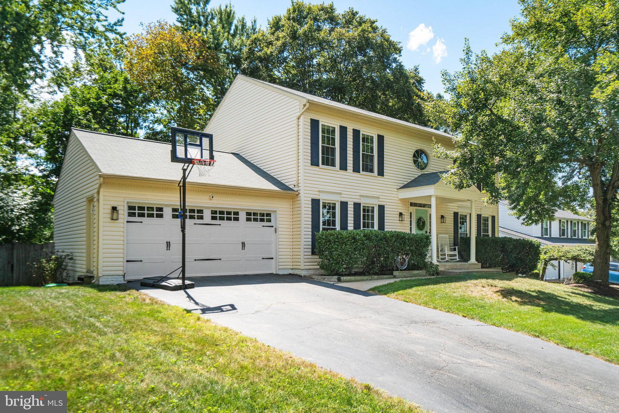 7838 Roundabout Way Springfield, VA 22153 - Photo 50 of 56 a view of a house with a yard and large tree