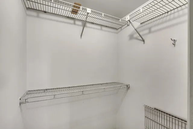 a view of a room with racks on the wall