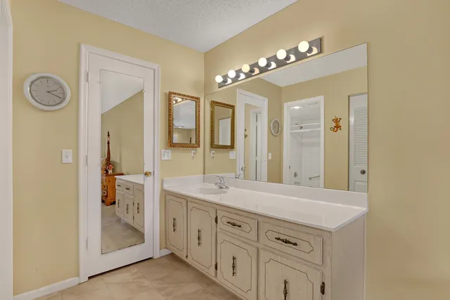 a bathroom with a shower and a toilet