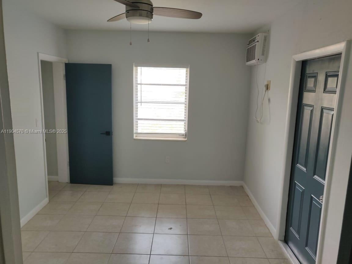 2300 Southwest 3rd Avenue, Unit 9 Miami, FL 33129 - Photo 13 of 13 a view of an empty room with a window
