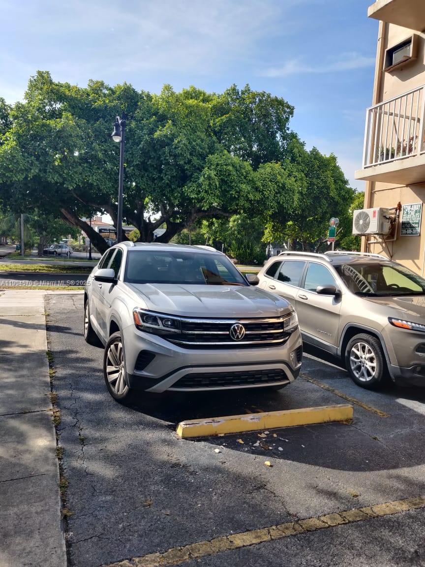 2300 Southwest 3rd Avenue, Unit 9 Miami, FL 33129 - Photo 3 of 13 a view of a yard in front of a house