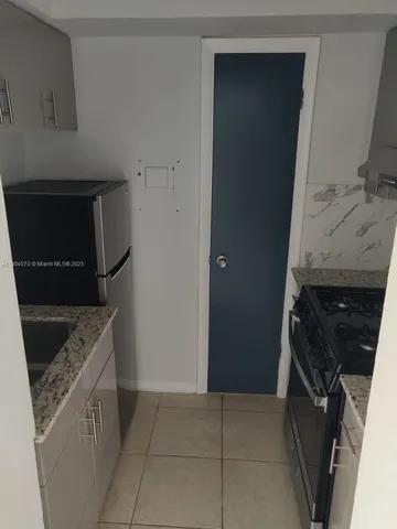 a utility room with washer and dryer