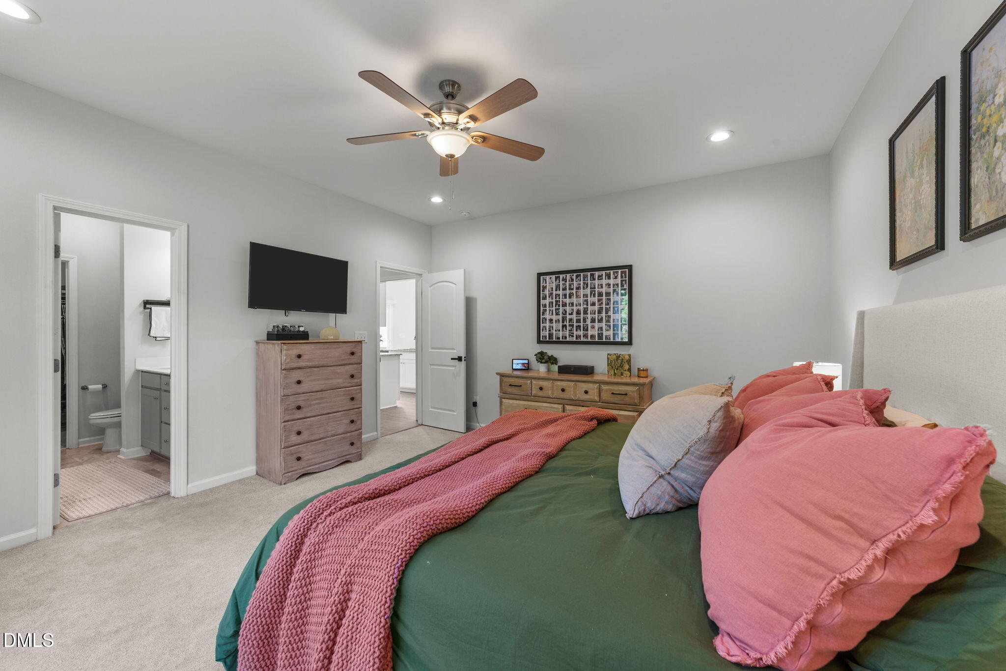 67 Overdrift Court Selma, NC 27576 - Photo 25 of 36 a bedroom with a bed and a flat screen tv