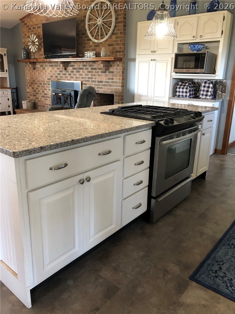 86 Divide Ridge Road Given, WV 25245 - Photo 12 of 42 Kitchen island with granite countertops
