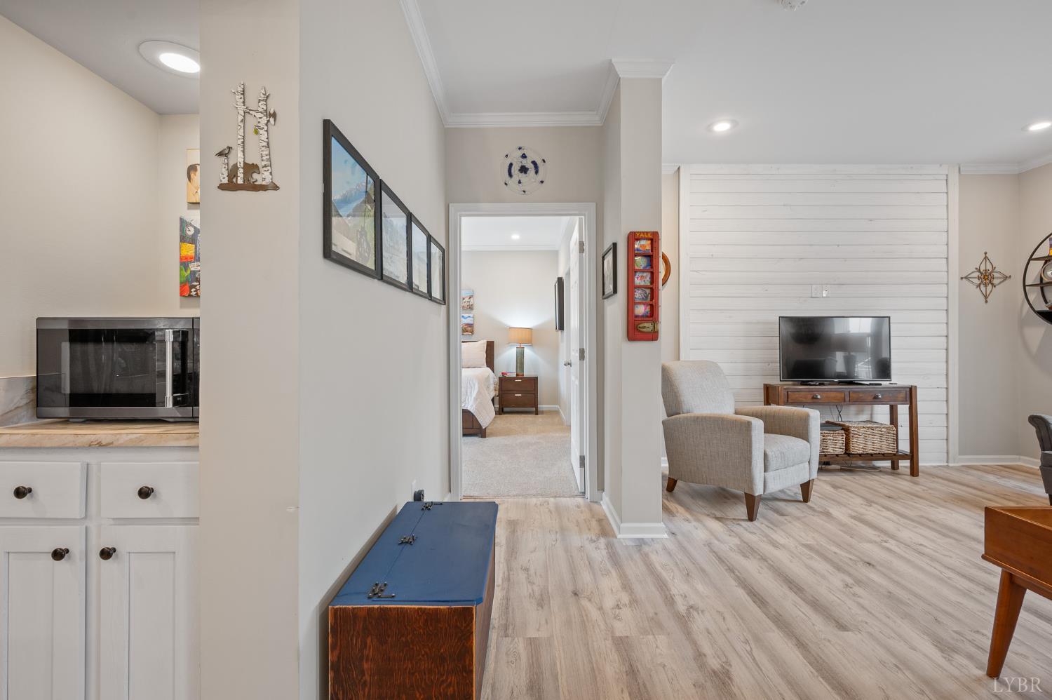 5049 Horseshoe Bend Road Goodview, VA 24095 - Photo 12 of 43 a living room with furniture and a flat screen tv