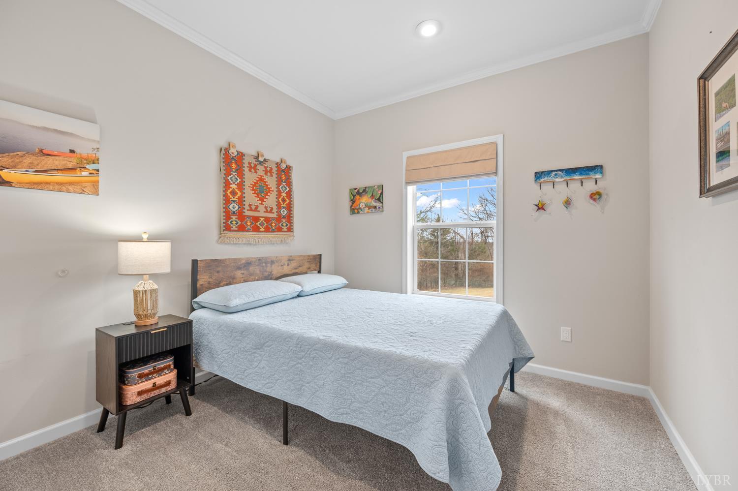 5049 Horseshoe Bend Road Goodview, VA 24095 - Photo 38 of 43 a bedroom with a bed and a window