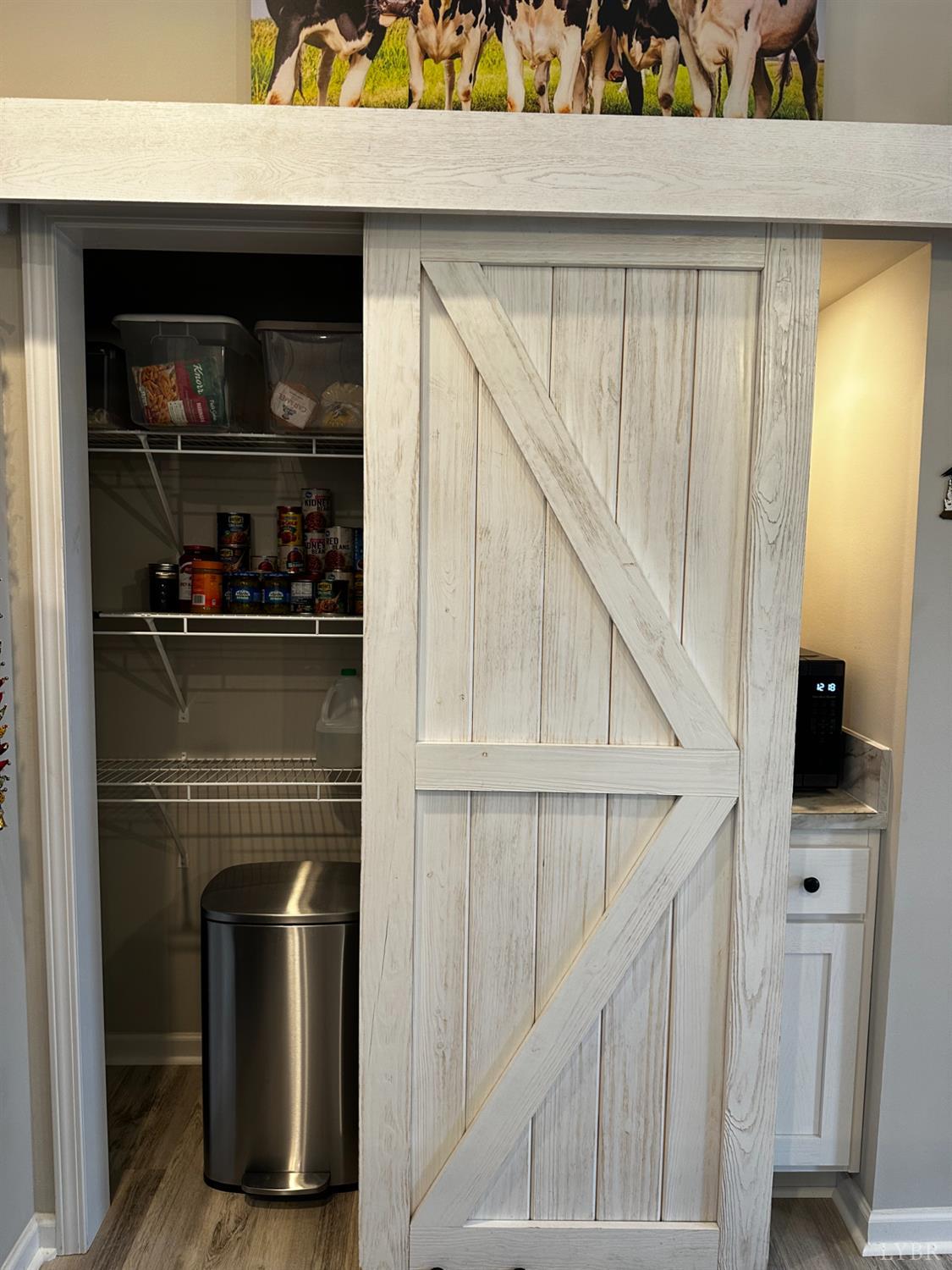 5049 Horseshoe Bend Road Goodview, VA 24095 - Photo 43 of 43 a kitchen with a refrigerator and a stove