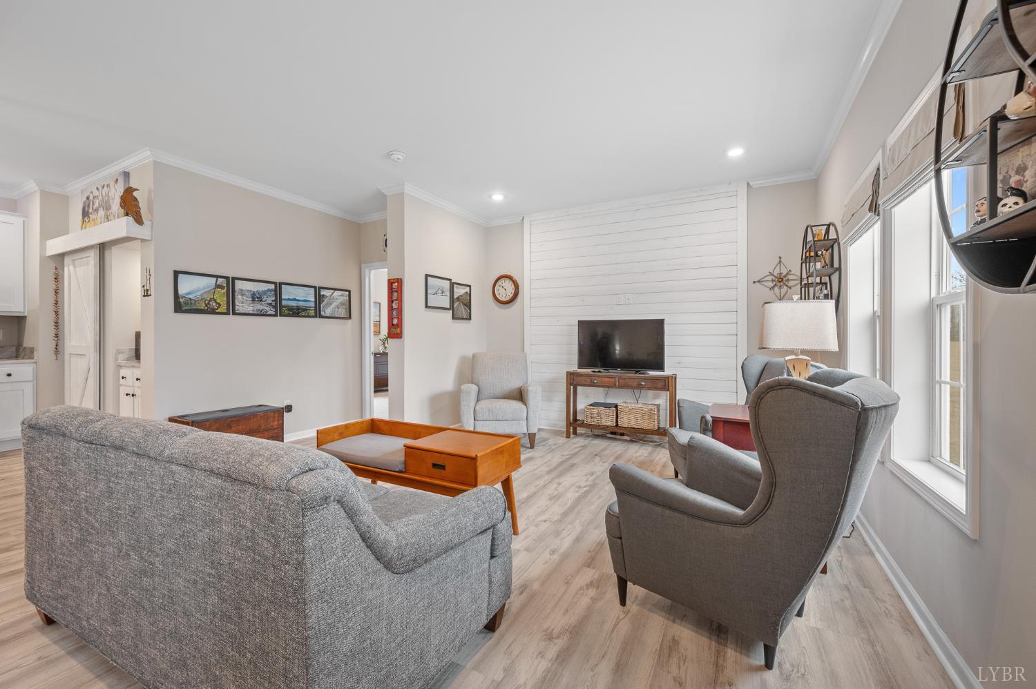 5049 Horseshoe Bend Road Goodview, VA 24095 - Photo 7 of 43 a living room with furniture and a flat screen tv