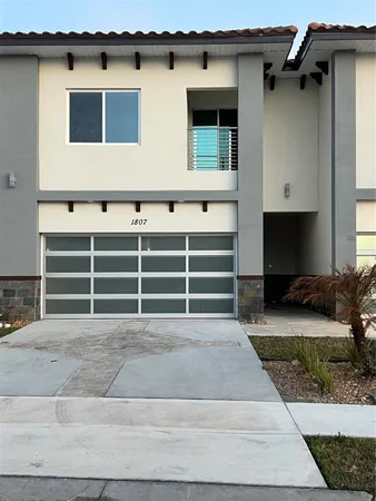 a side view of a house with garage