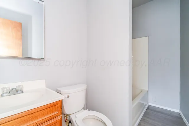 a bathroom with a sink and a toilet