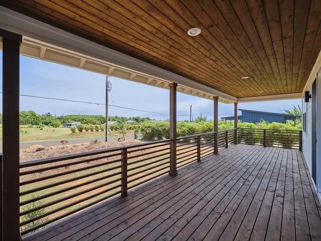 a view of railway station with wooden floor