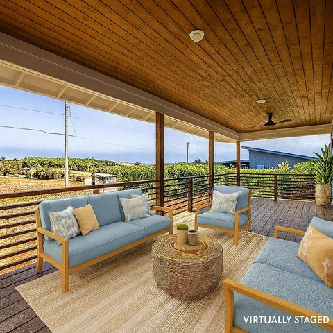 a outdoor living space with patio furniture and garden view