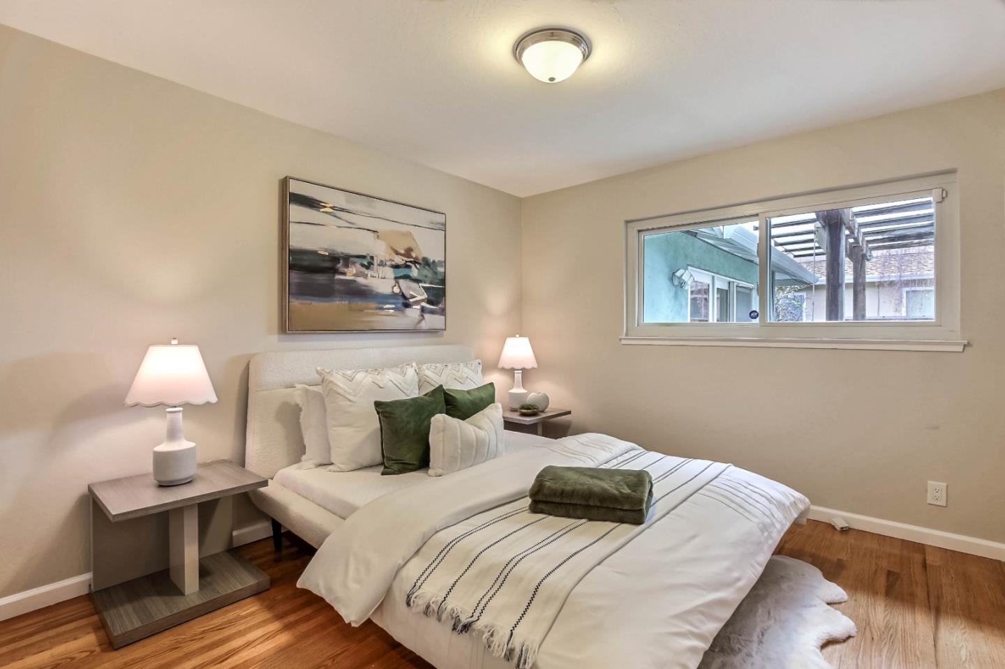 744 Cornell Drive Santa Clara, CA 95051 - Photo 15 of 19 a bedroom with bed and a window