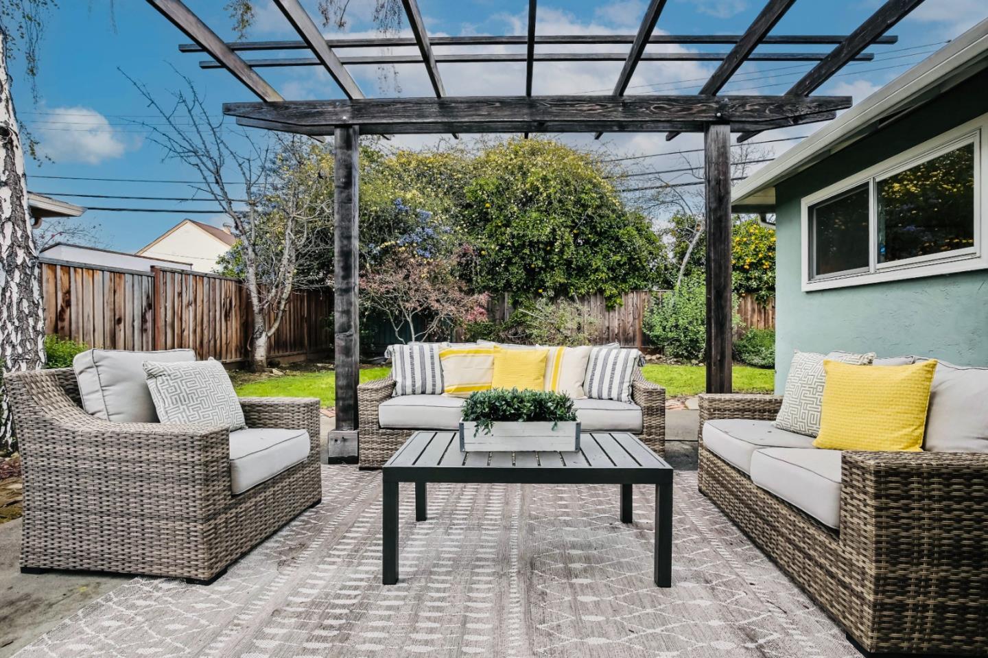 744 Cornell Drive Santa Clara, CA 95051 - Photo 19 of 19 a outdoor living space with patio furniture and a fireplace
