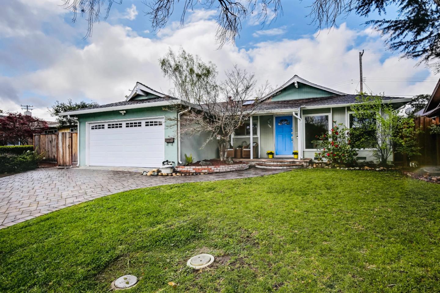 744 Cornell Drive Santa Clara, CA 95051 - Photo 2 of 19 a view of a house with backyard and a tree