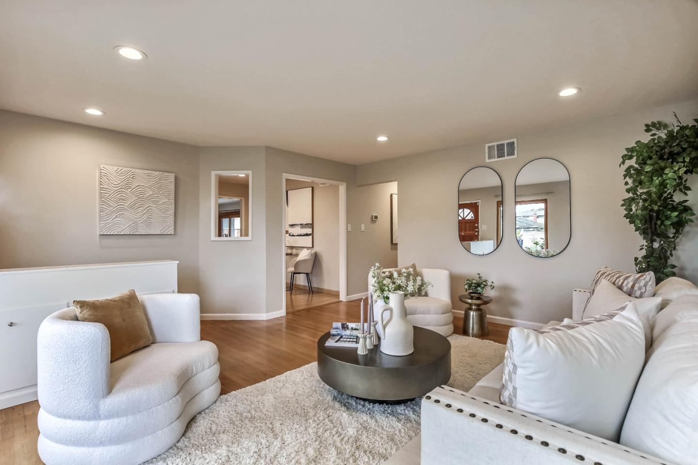 744 Cornell Drive Santa Clara, CA 95051 - Photo 4 of 19 a living room with furniture and a wooden floor