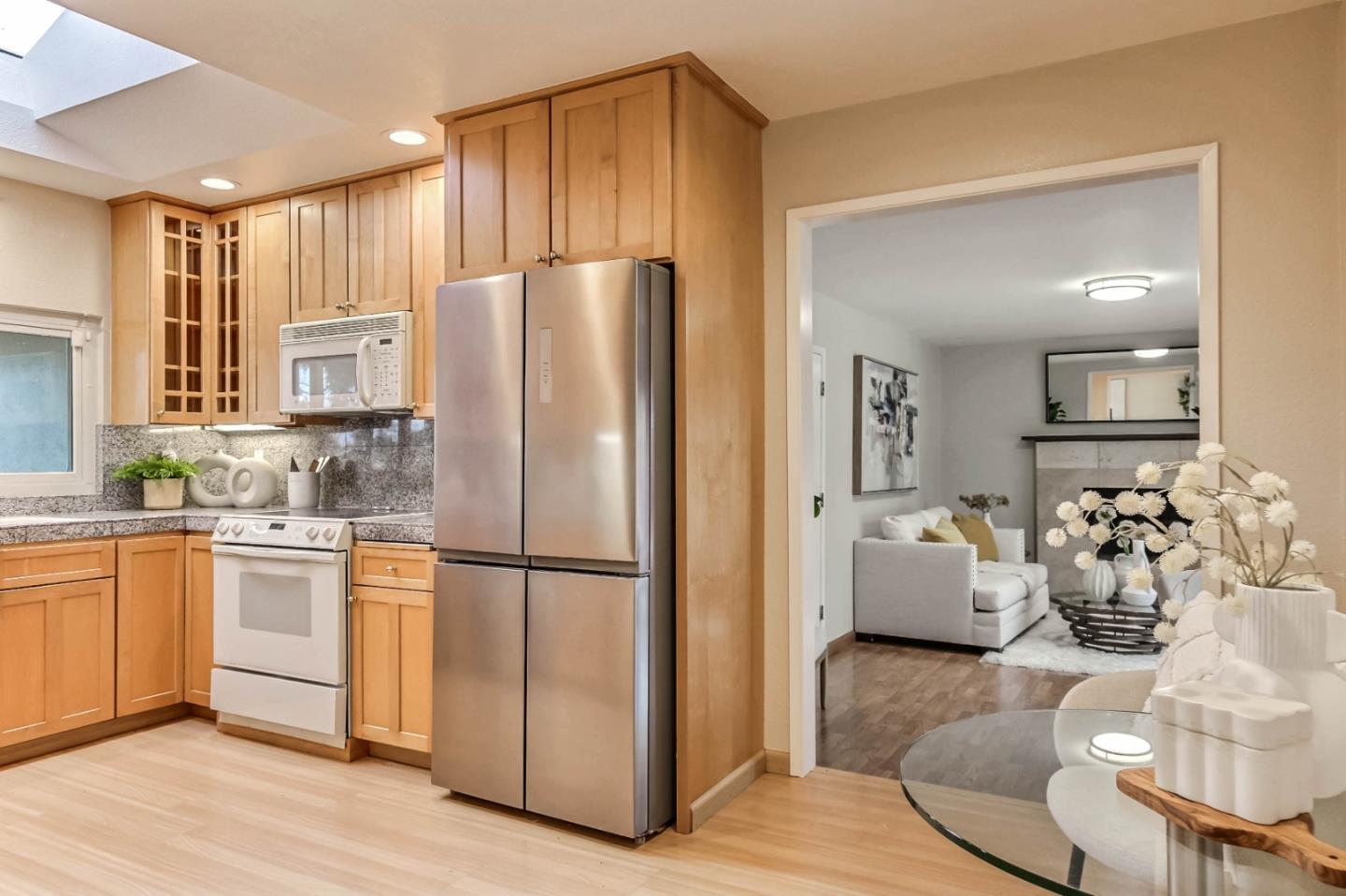 744 Cornell Drive Santa Clara, CA 95051 - Photo 8 of 19 a kitchen with stainless steel appliances granite countertop a refrigerator sink and cabinets