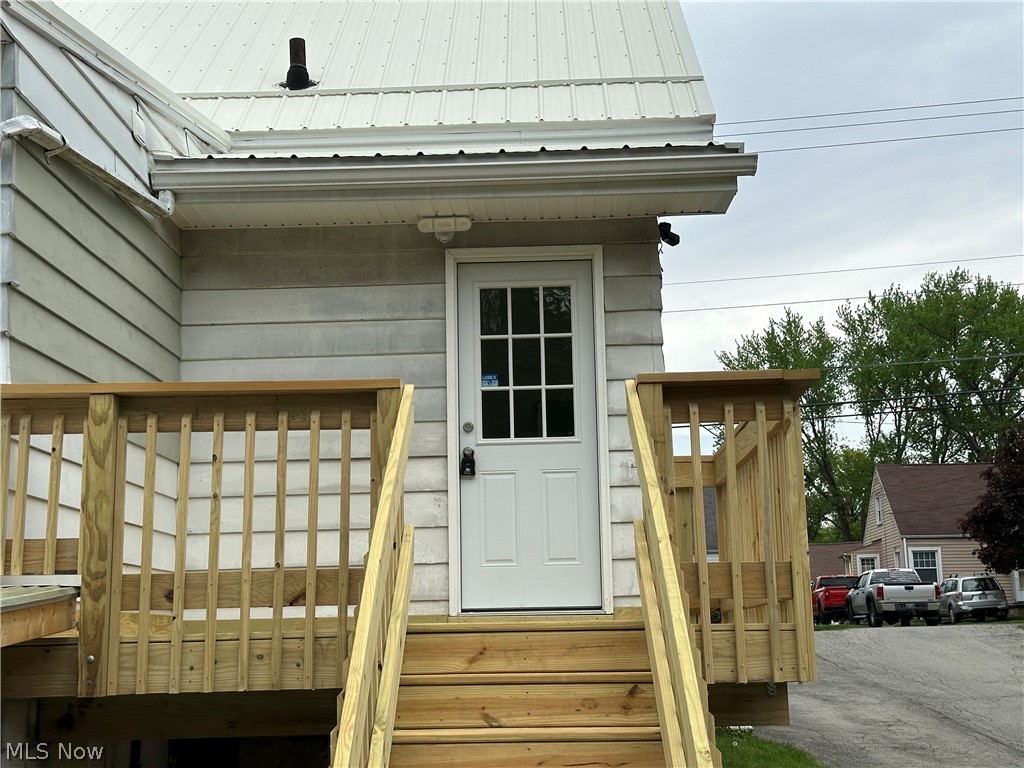 119 Shields Road, Unit 3 Youngstown, OH 44512 - Photo 1 of 12 Property entrance featuring a metal roof