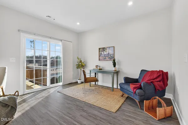 a view of a balcony with chairs