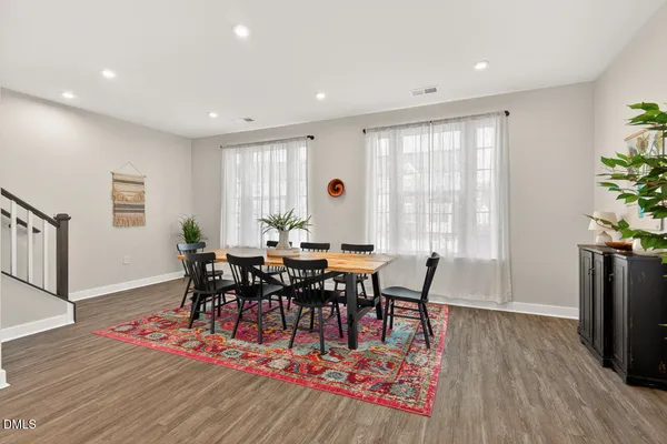 a open kitchen with a table and chairs in it