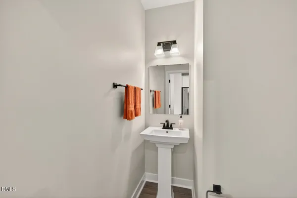 a spacious bedroom with a bed and a couch