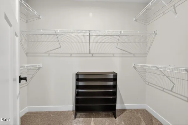 a workspace with furniture and a window