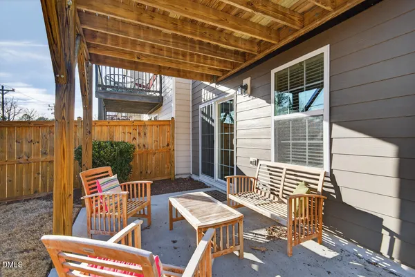 an aerial view of a house with a swimming pool