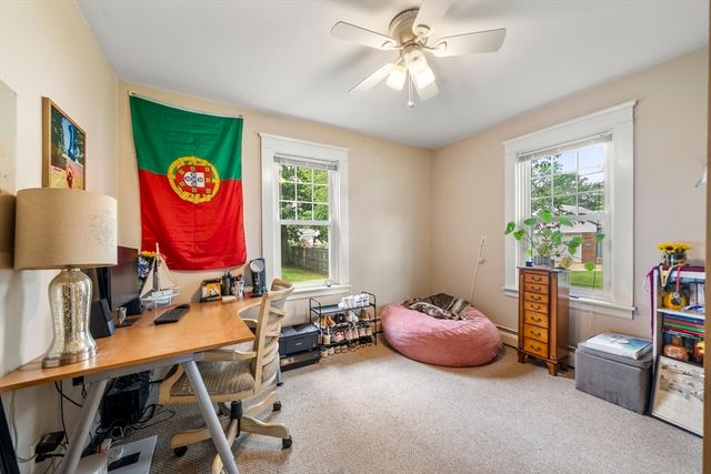 a room with furniture and a window