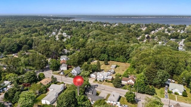 an aerial view of a city with lots of residential buildings