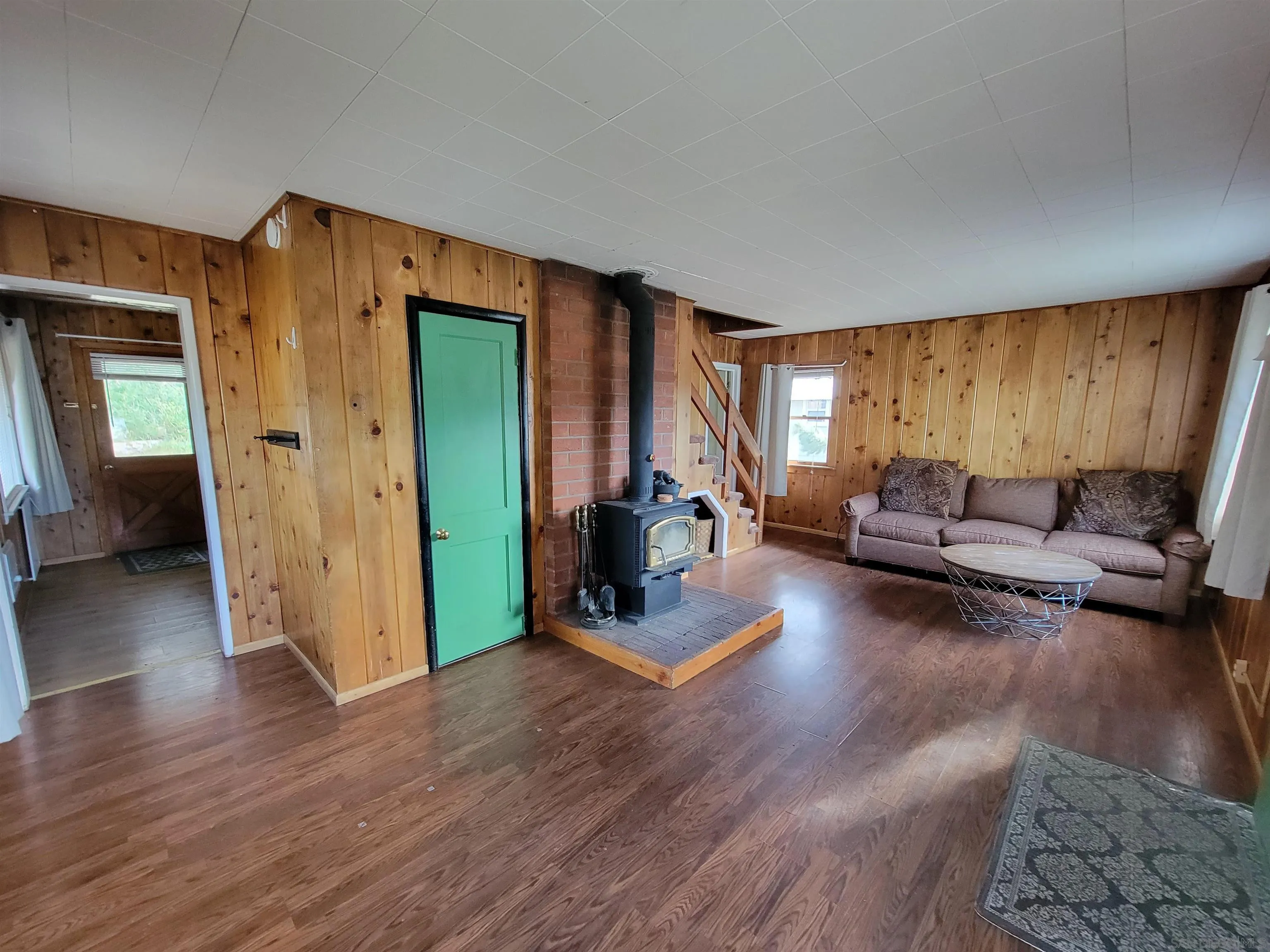 1701 Old Mammoth Road, Unit 2 Mammoth Lakes, CA 93546 - Photo 3 of 7 a living room with furniture and a wooden floor