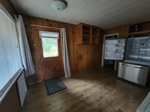 a view of kitchen with furniture and window