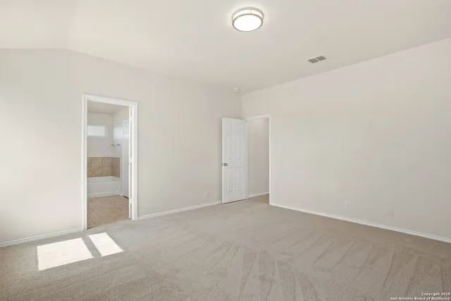 an empty room with an entryway