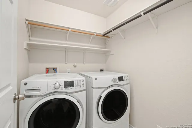a utility room with dryer and washer