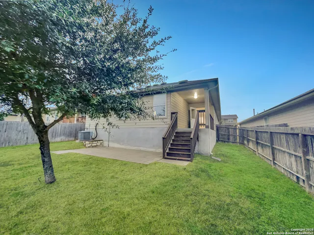 a view of outdoor space with deck and yard