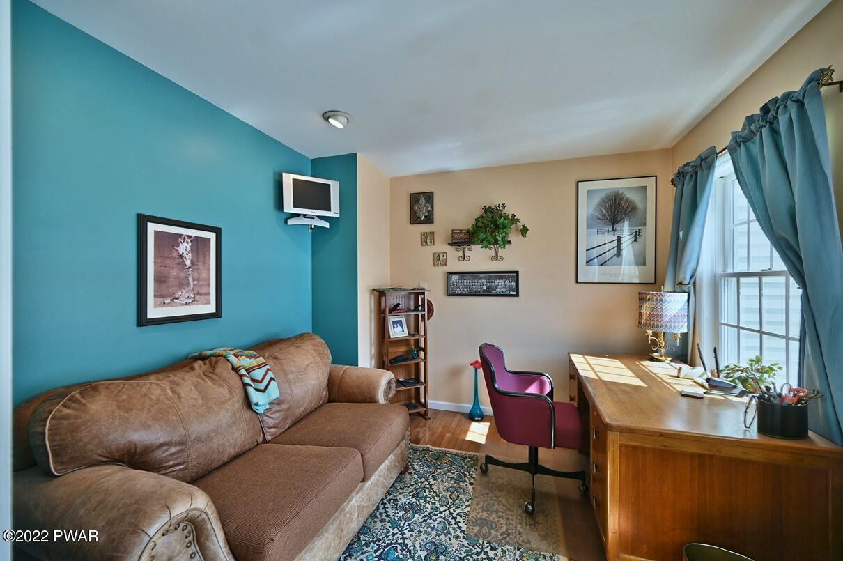 183 Valleyview Road Greentown, PA 18426 - Photo 12 of 110 a living room with furniture and a window