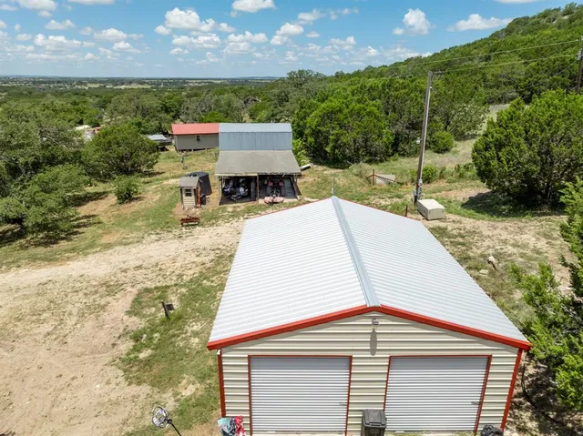 a view of backyard and entertaining space